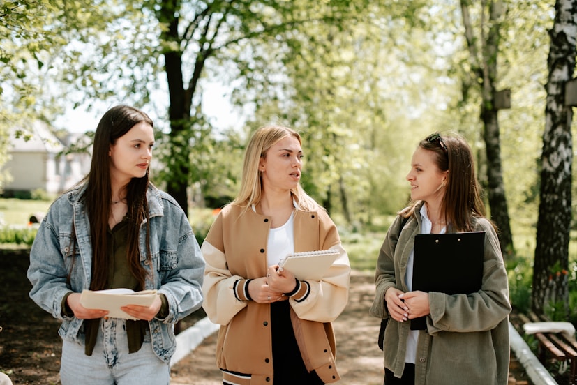Students walking outdoors on campus