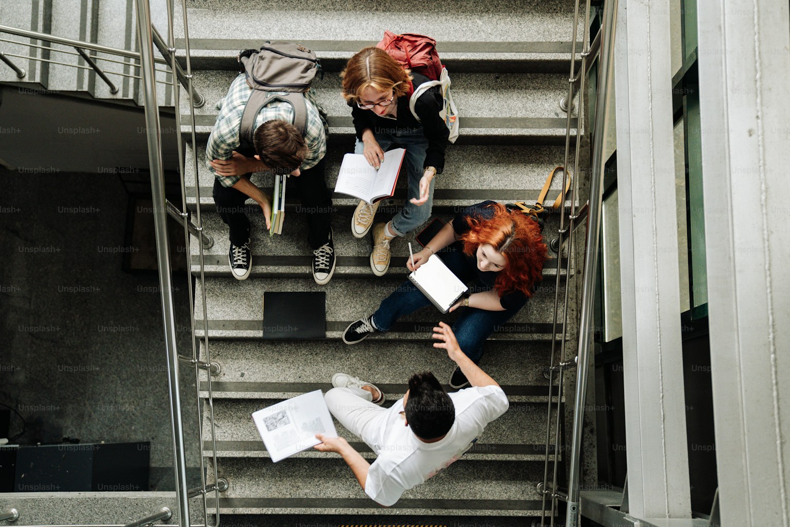 Students working together on stairs