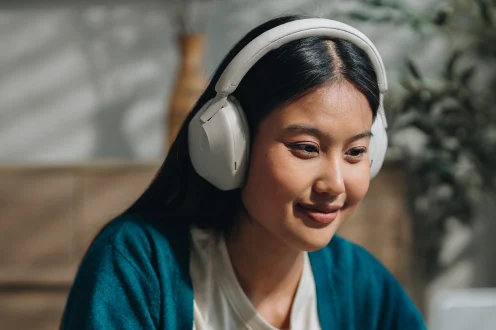 Student studying with headphones on