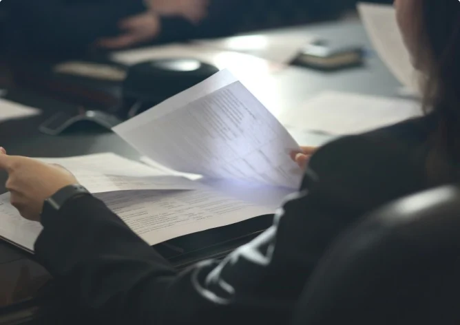 Researcher reviewing a prototype